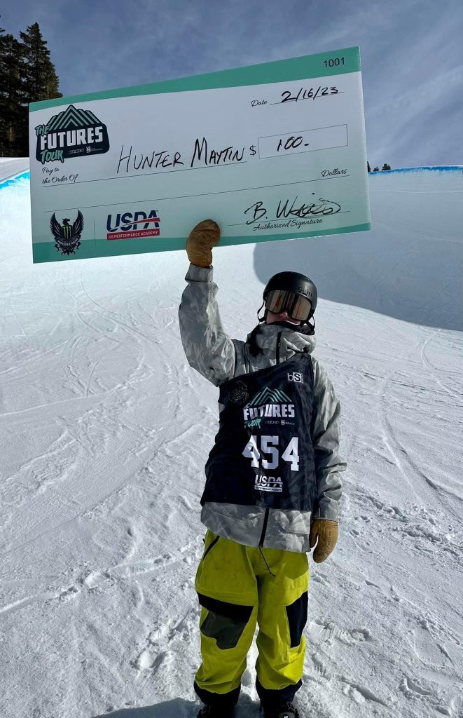 hunter maytin receiving a check for halfpipe olympics